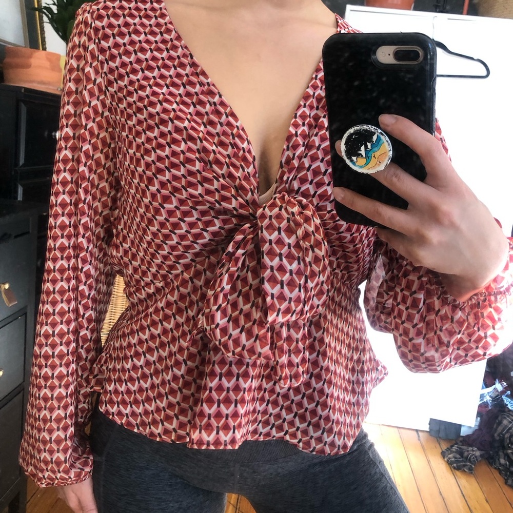 Forever 21 70s inspired blouse with open slit in back side